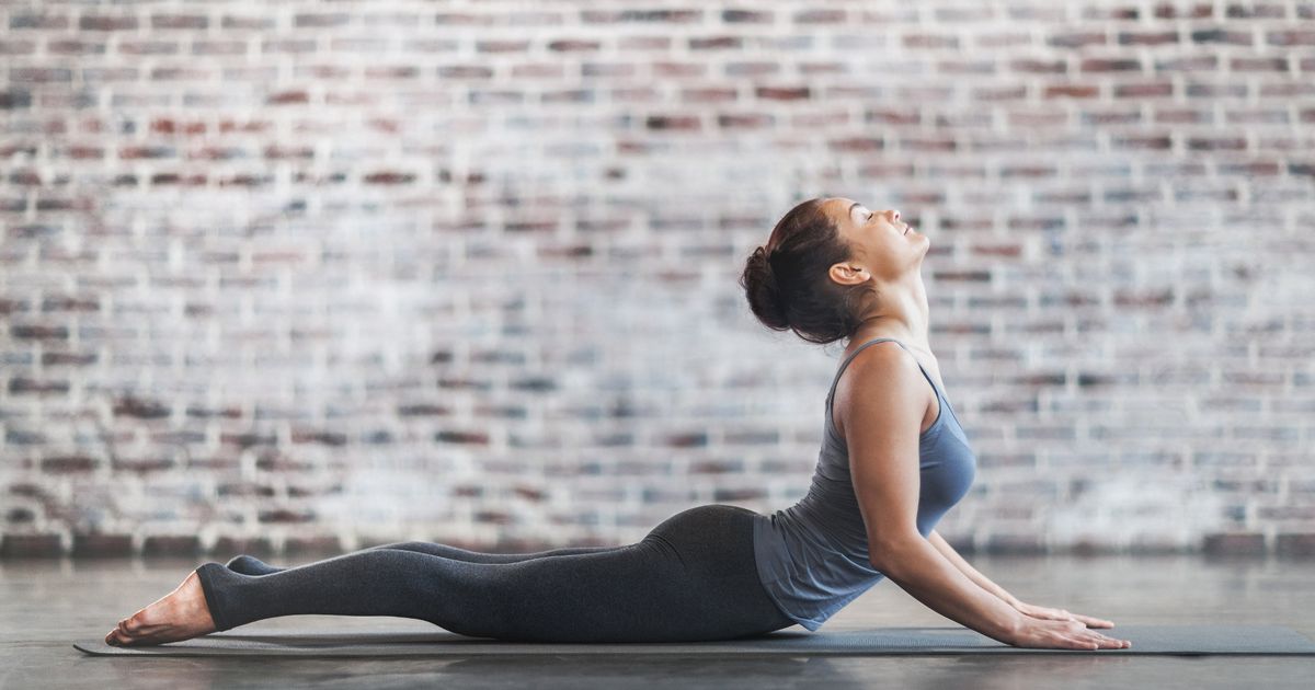 0_Young-Woman-Doing-Yoga-Meditation-and-Stretching-Exercises